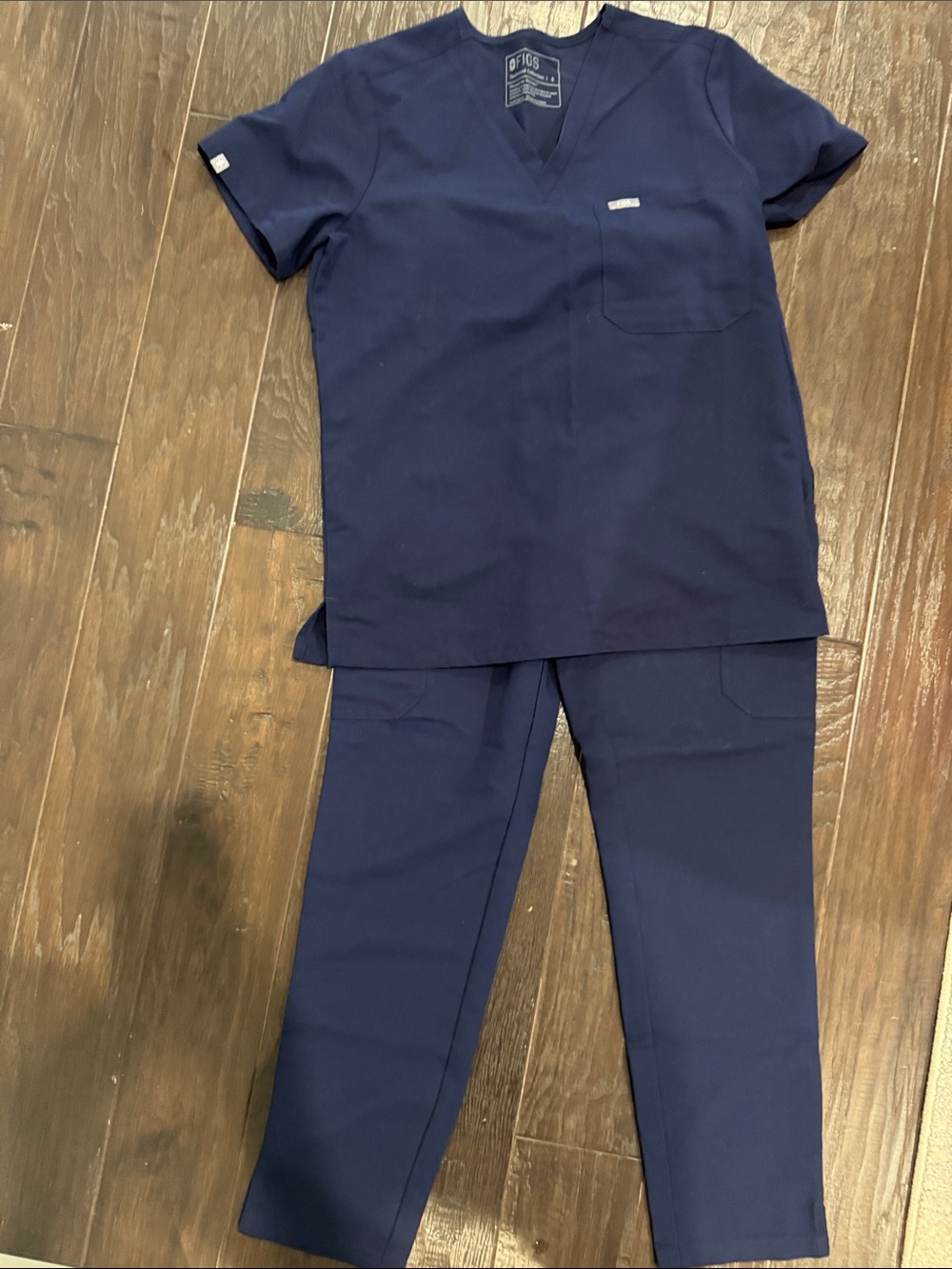 FIGS Navy V-Neck Medical Scrub Top with Chest Pocket and straight leg cargo pant